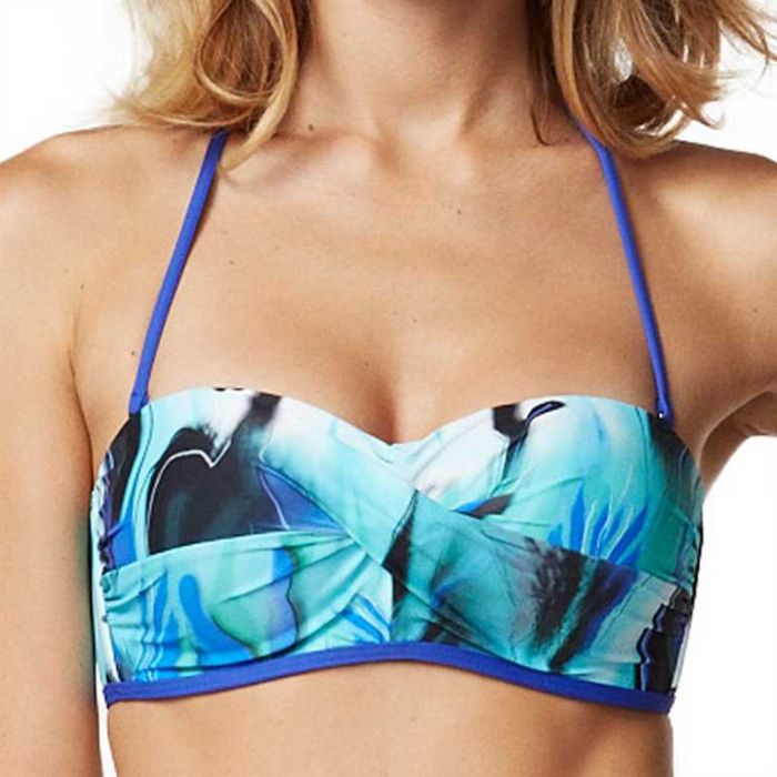 Turn up your beach style with the Freedom Twist Bandeau! The molded cups and silicone wires are designed to give you shape and support, while the removable halter strap and clip back closure keep it secure. Plus, the gripper tape ensures you won't be slipping and sliding around - now that's something to shout about!