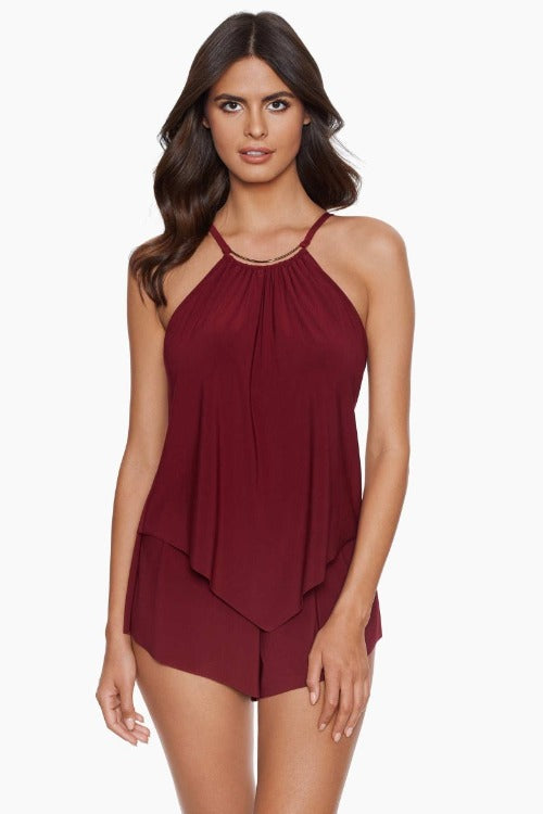 Be confident and radiant in the sun with the Magicsuit Goldie One Piece Swim Romper. Its flattering control ensures a gorgeous, glamorous look and long-lasting fit. Plus, adjustable straps, an underwire bra with removable soft cups, and a wide leg cut will have you looking effortlessly chic by the poolside!