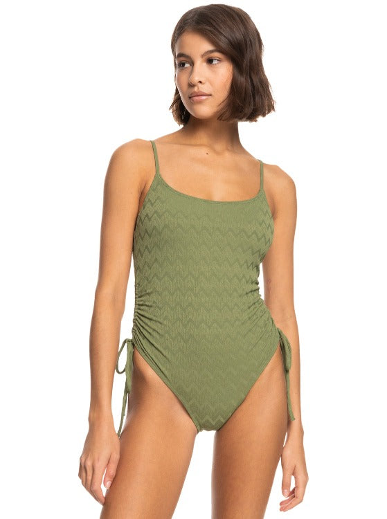 Be the life of the beach bash in the Roxy Current Coolness One-Piece Swimsuit! This stylish stunner is made from a luxe recycled jacquard fabric that's resistant, stretchy, and oh-so-soft. With adjustable cup and leg openings to show off your shapely silhouette, you'll be beach-ready in a jiffy! Rock it at sand n' sea and beyond!     ERJX103518 