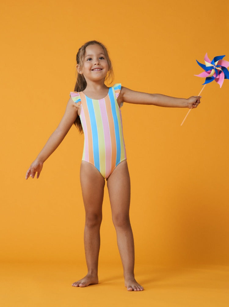 Ready for some poolside fun? Dive into summer with this cute and colorful one-piece! Crafted from recycled swim fabric, the Colors Of The Sun is perfect for an active day of splashing around. Show off the stripes and ruffled straps and stay pool-party ready with its chlorine-resistant tech! Life's a beach in this cool swimsuit!