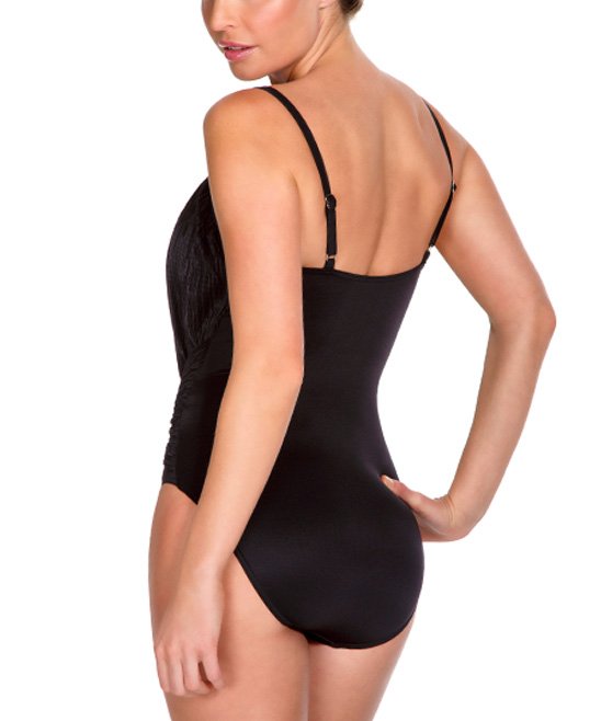 Feel like a million bucks in the Magicsuit Jerry One Piece! This figure-flattering one-piece features an eye-catching twist-front design with hidden underwire and adjustable straps for a comfortably supportive fit. Because who says modest cuts can't be sleek?! Bring on the poolside confidence with this amazing suit. Boom!