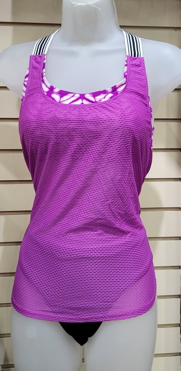 Sport Mesh Tankini Set  This tankini set is perfect for my ladies who love their sporty and supportive suits. This active top is generous in the bust and fits an A-D cup. Fits true to size. Comes in this beautiful pink and sky blue colors.