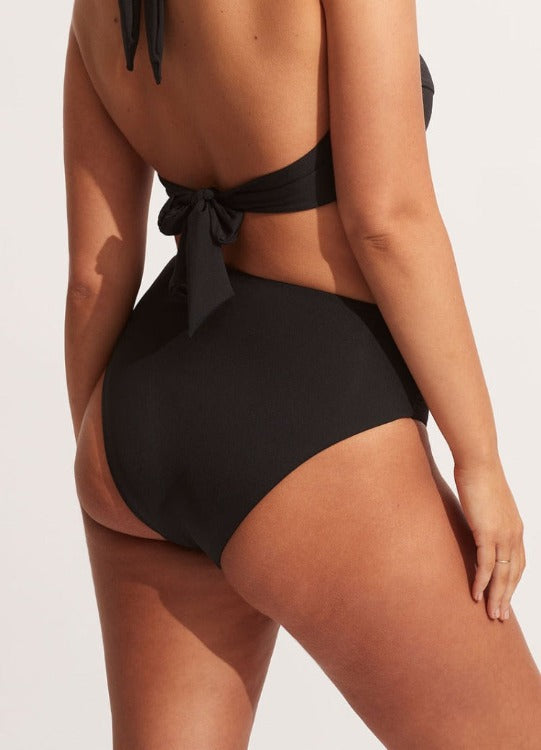 Seafolly Collective High Waist Wrap Front Bikini Bottom  Style: 40643-942  This high-waisted bikini bottom creates a lengthened silhouette, enhancing the look of your legs. Legs for days ladies!  For best fit please refer to this size guide.