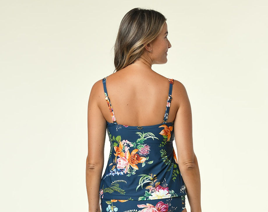Our Floral Enchantment draped tankini top is an eye-catching spin on the classic tankini. The bandeau neck and draped fabric gracefully flaunt your shape, and the UPF 50 sun protection, buttery soft fabric, built-in cups, and adjustable & removable straps make it a wardrobe must-have!