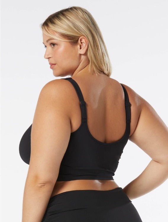 Full-busted babes, your time has come! Step it up this summer with Coco Reef's Elevate Bra-sized Shirred Underwire Bikini Top. This fab black top comes with removable soft cups, underwire and adjustable drawstring center front straps, plus silver trim for extra pizzazz. Ready for a shapely support, the perfect fit and total comfort? This bra-sized bikini is your answer.