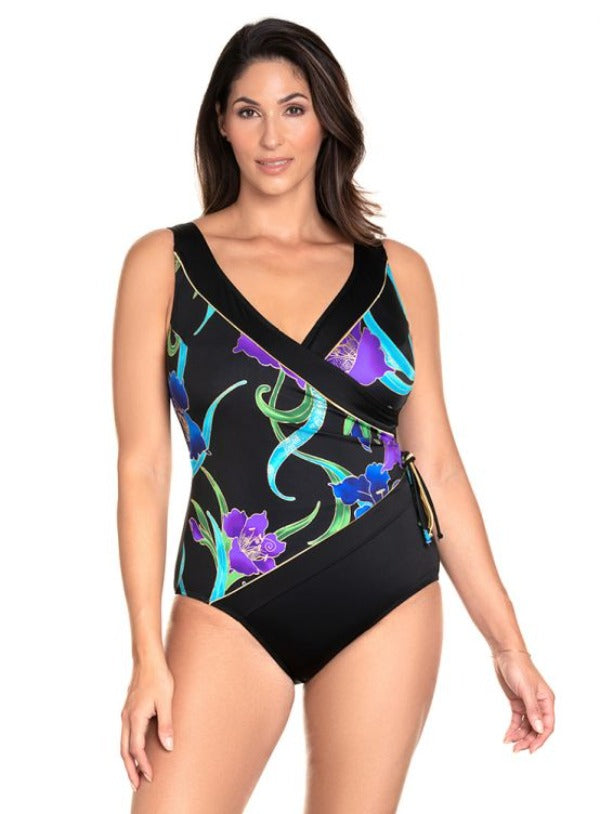 A beautiful burst of bright blues, purples, and teals takes center stage in this hot-to-trot one-piece! Boasting a flattering black scoop back and daring leg cut, this jaw-dropping swimsuit features a Soft Cup Bra and V-Neckline with Fixed Straps for a sultry look.