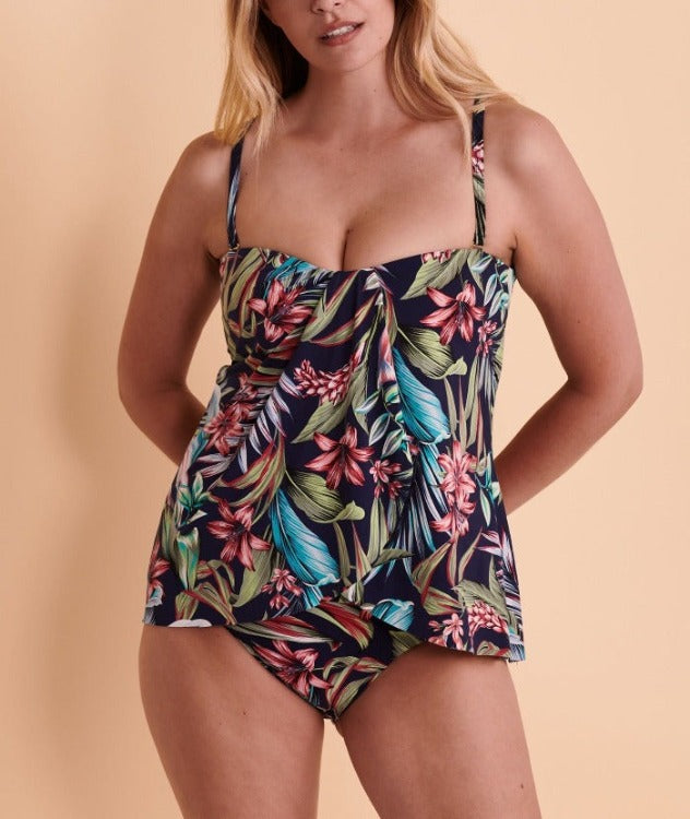Dive into summer fun with the Flare Bandeau Tankini! Featuring a faux flyaway front and side boning, this two-piece suit is ready for whatever ocean waves or pool parties come your way. With adjustable straps and convertible tops and bottoms, you can switch it up to flatter any figure and get your tan on! Get your beach babe look, and get out there!