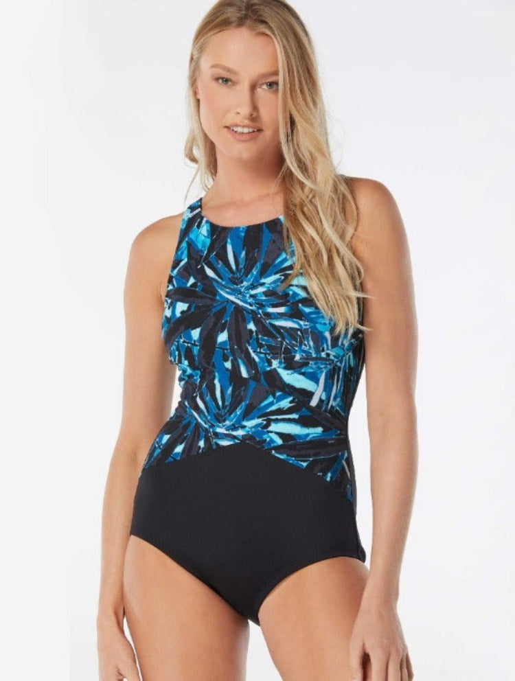Lounge in Gabar's ocean-inspired fern-print one-piece. The tummy control design helps slim your look, while the stay-put leg and high neckline keep it in place. Its Hydrofinity fabric resists chlorine for 300+ hours, is breathable, offers UPF 50+ protection, and dries quickly. Features removable soft cups, adjustable straps, and a gripped leg for a conservative stay-put fit, plus mastectomy cup entry up to a C cup.