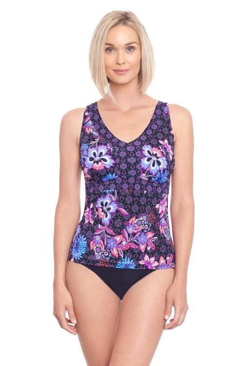 Feel cool, confident and oh so chic in this Hideaway V-Neck Tankini Set! With a stunning kaleidoscope of colors and a sophisticated pattern, you'll be turning heads everywhere you go. And with adjustable straps and tummy control features, you'll feel comfy and stunning all summer long! Wowza!  Patterns and colours may vary.