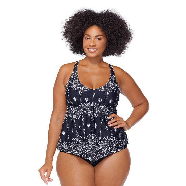 Make a splash in this Raisins Curve Trinidad Costa Tankini Set! This curvy swimsuit is a head-turner with its fun handkerchief pattern and cut. Plus, it's got all the right features - soft cup support, T-back, high waisted bottoms, and tummy control - letting you feel and look your absolute best. Why wait? Dive into summer now!    J840521/ J840061